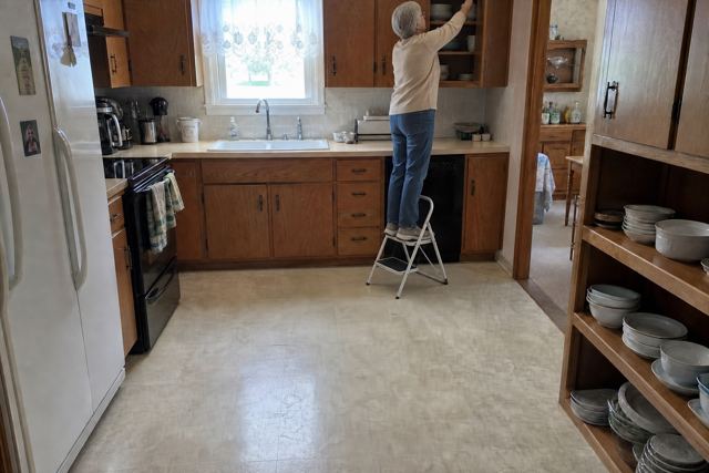 kitchen: Unstable step stool or chair used for reaching